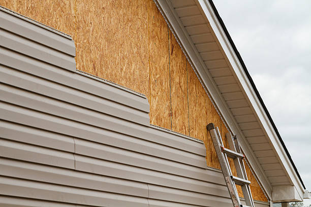 Professional Siding Contractor technician working in Intercourse, PA